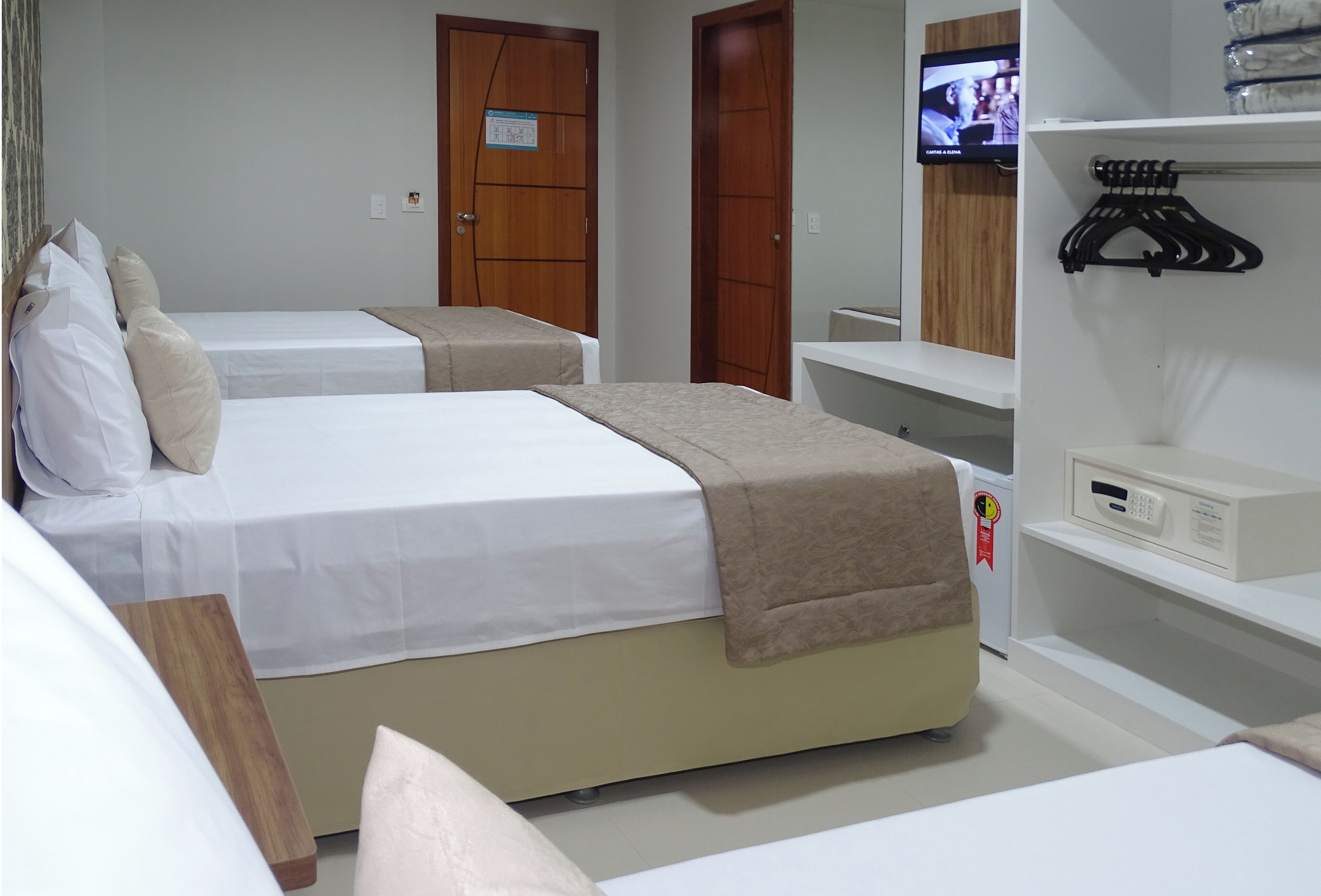 deluxe triple room | 1 bedroom, minibar, desk, blackout curtains