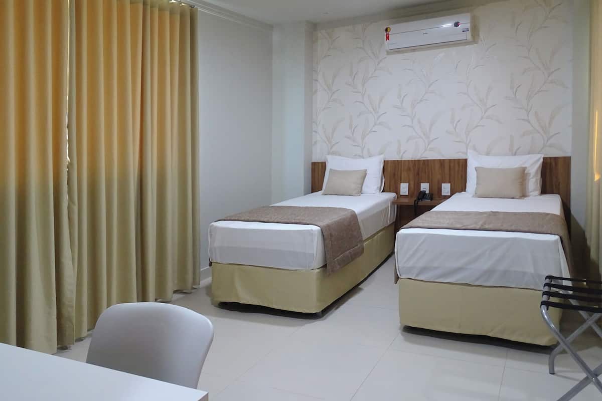 deluxe twin room | 1 bedroom, minibar, desk, blackout curtains