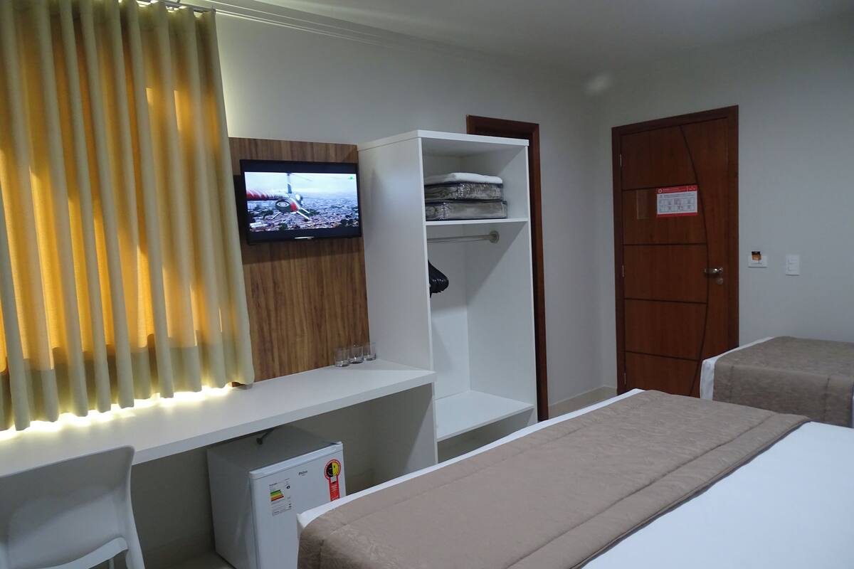 luxury triple room | 1 bedroom, minibar, desk, blackout curtains