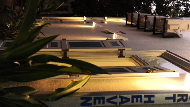 A rooftop terrace with multiple skylights and a view of the surrounding area. - Fort Heaven (Galle)