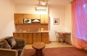 Apartment, 1 Bedroom | Private kitchen | Full-sized fridge, microwave, oven, stovetop - Apartments Ullberg (Vyborg)