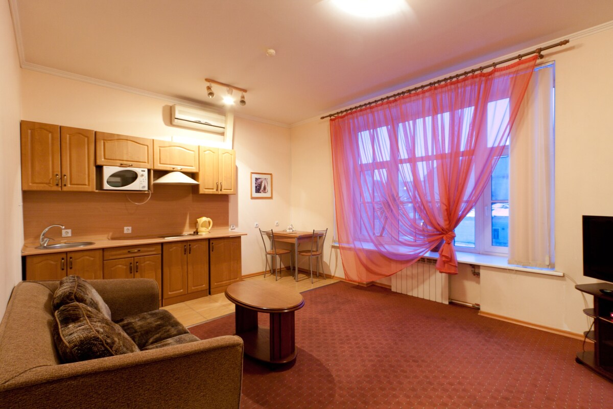 Apartment, 1 Bedroom | Living area | Flat-screen TV
