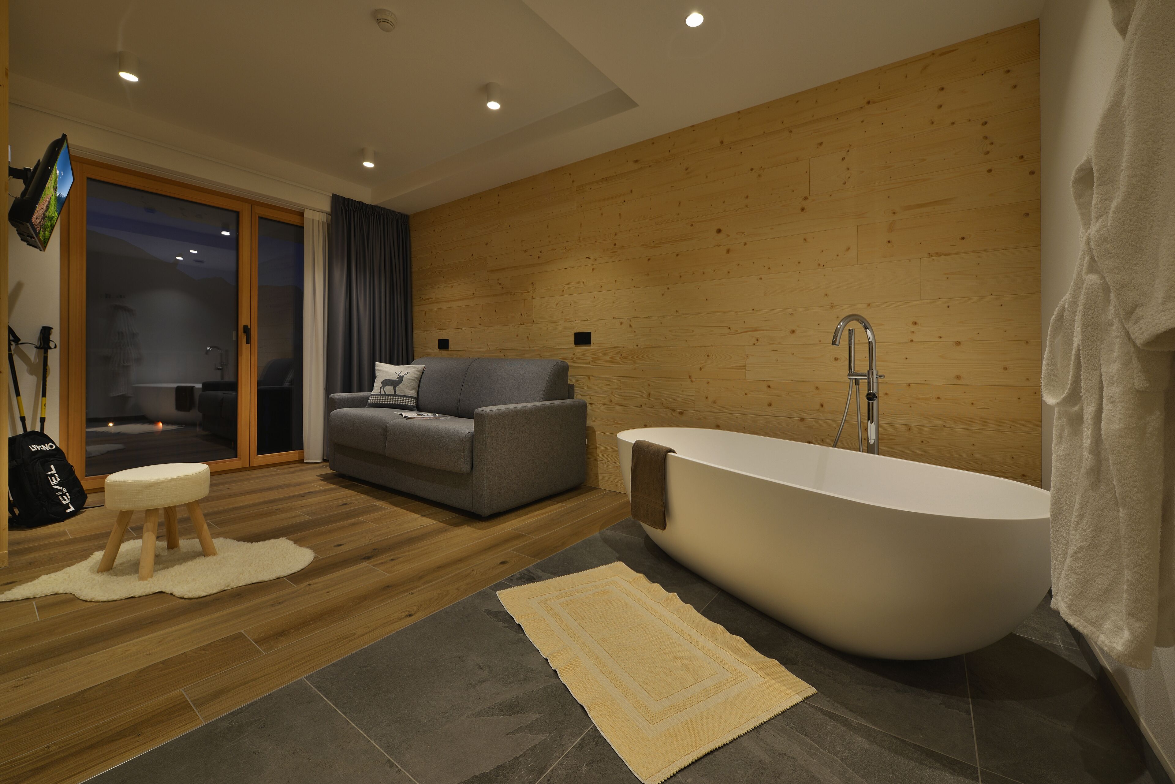 alpine suite with balcony | living area | tv