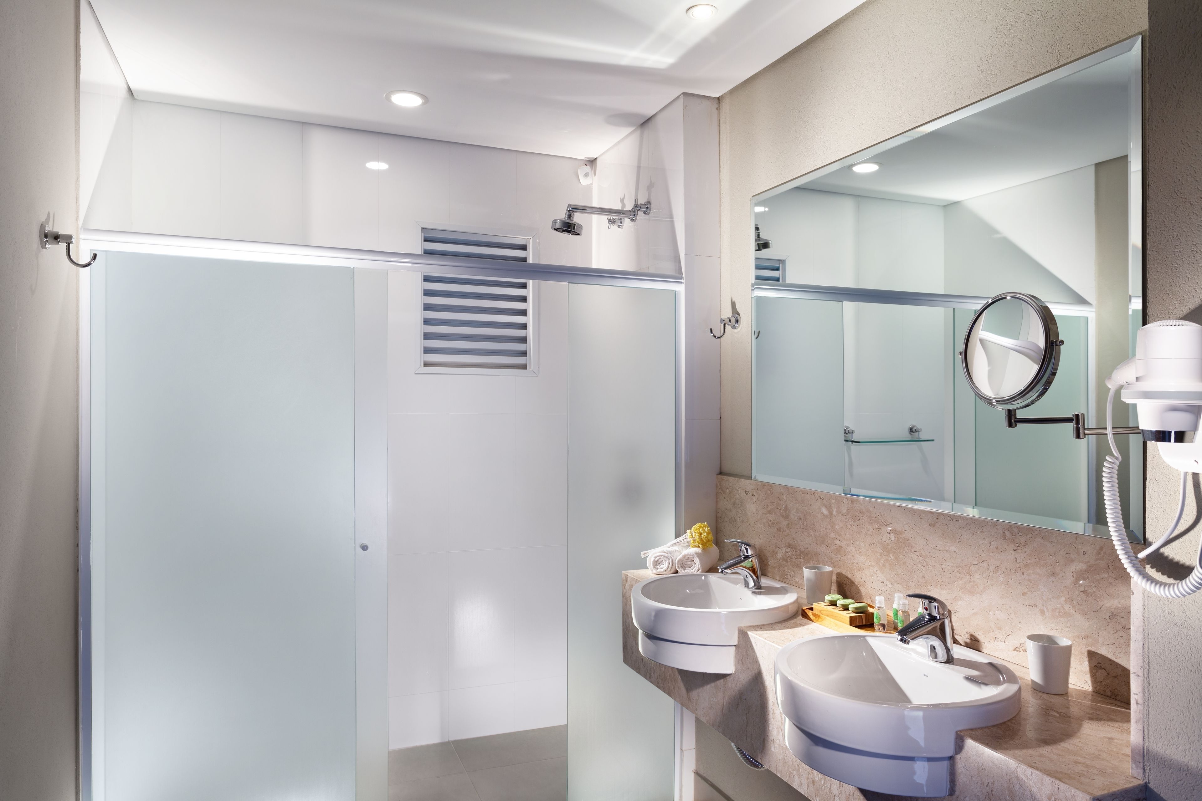 shower, free toiletries, hair dryer, towels