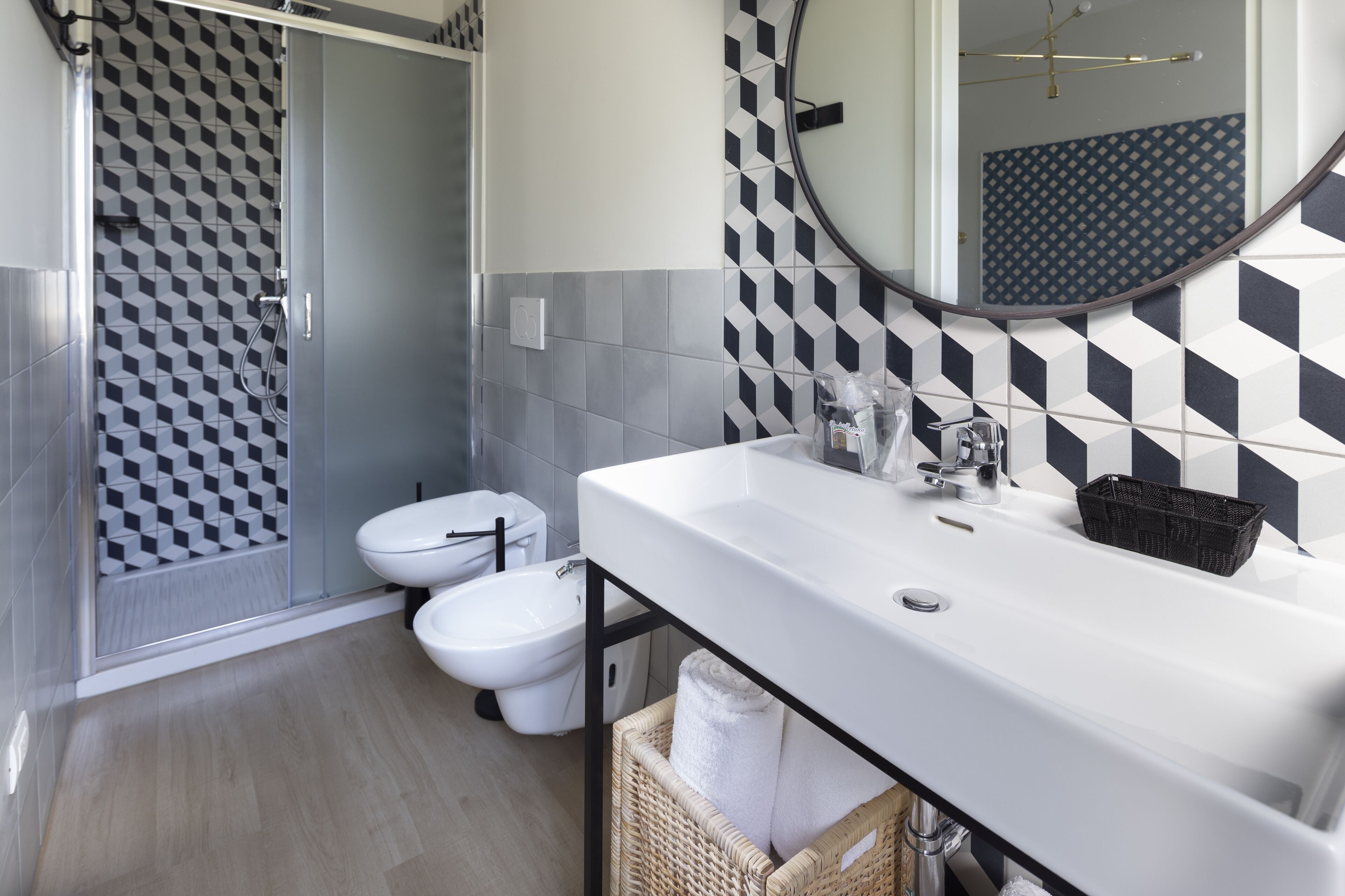junior suite | bathroom | shower, free toiletries, hair dryer, bathrobes