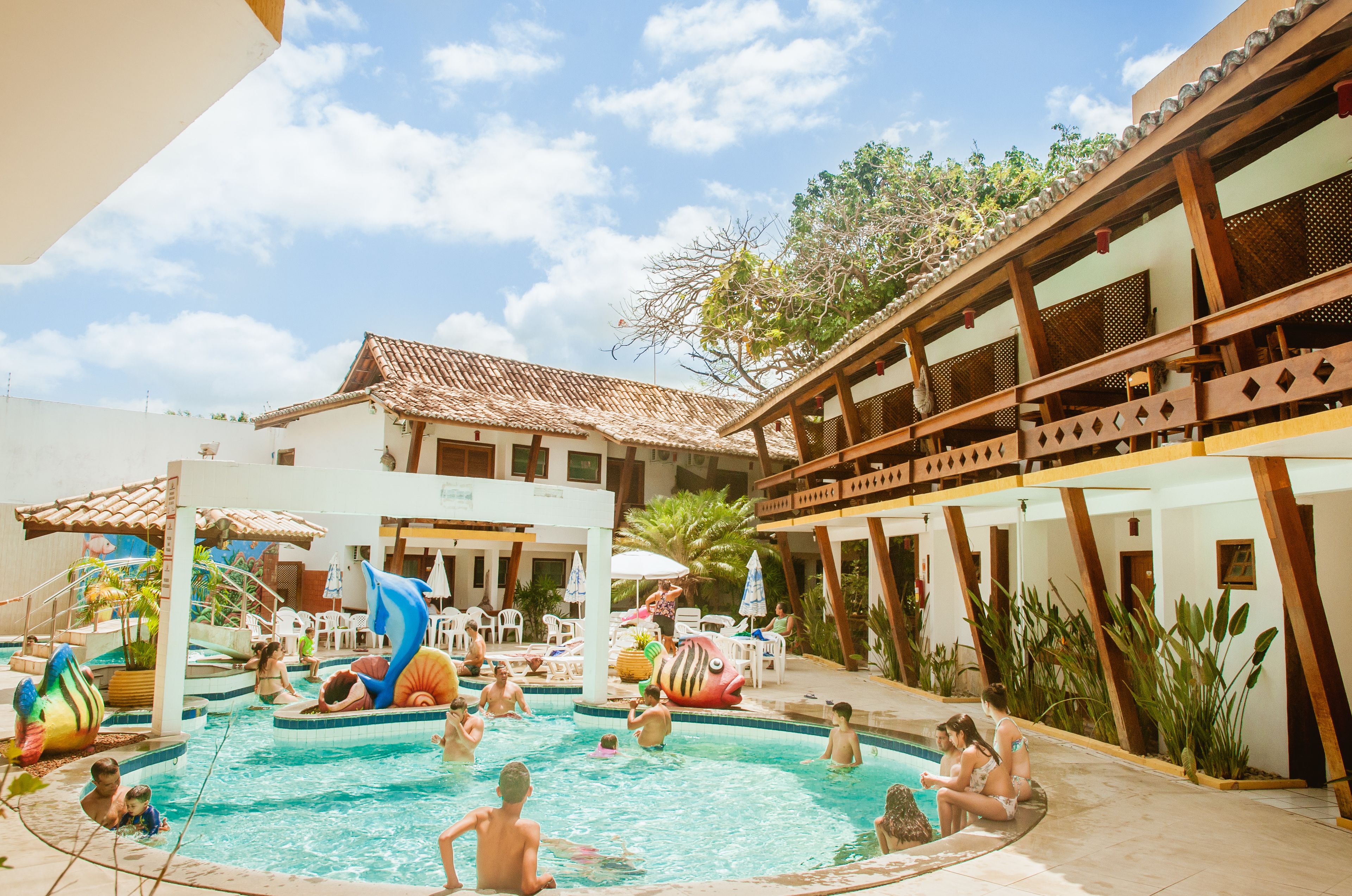 outdoor pool, open 8:00 am to 9:00 pm, pool umbrellas, pool loungers