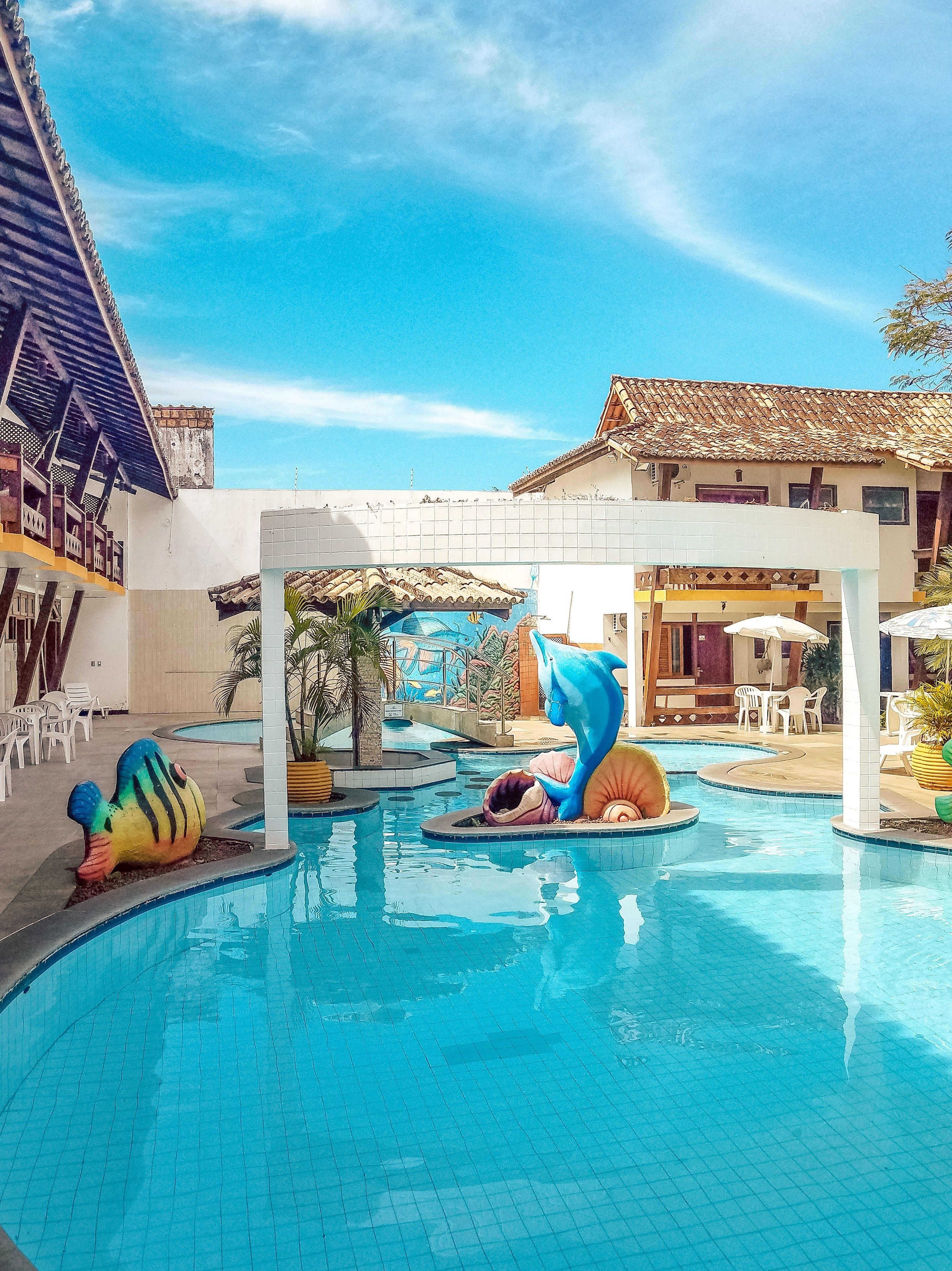 outdoor pool, open 8:00 am to 9:00 pm, pool umbrellas, pool loungers