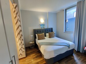 Appartement exécutif | Literie hypoallergénique, décor unique, ameublement unique
