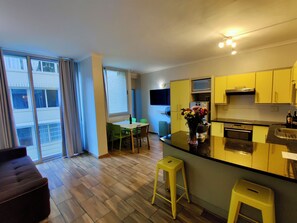 Appartement exécutif | Aire de séjour | Téléviseur à écran plat, Netflix