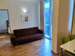 Executive Apartment | Living area | Flat-screen TV, Netflix - Urban Oasis at Perspectives (Cape Town)