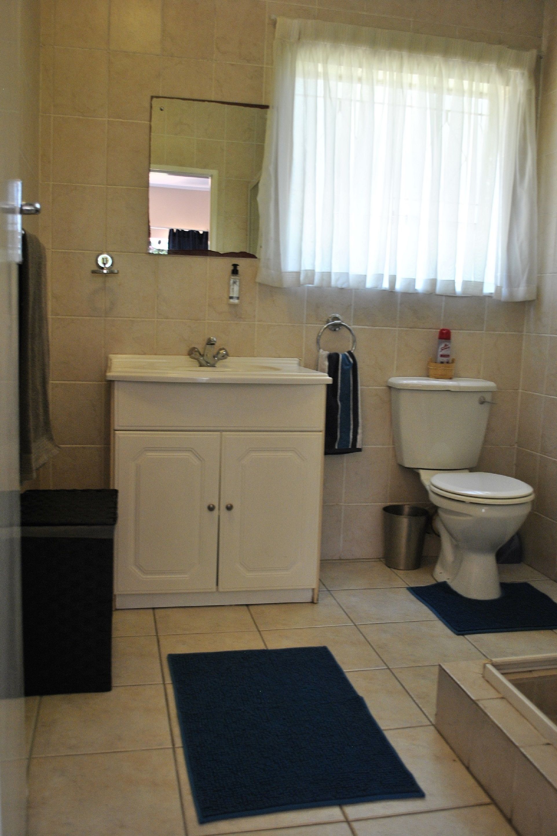 flamingo rest cottage 5 | bathroom | shower, free toiletries, hair dryer, towels