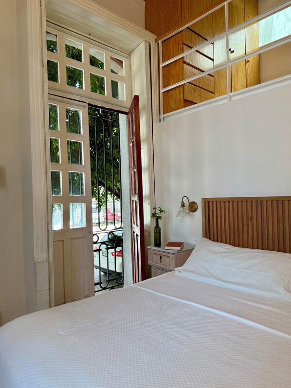 Suite, 1 cama King size | Ropa de cama de alta calidad, edredón y minibar