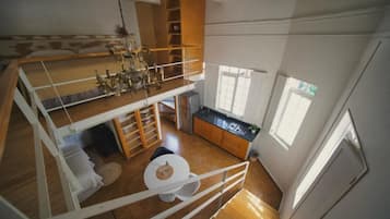 Loft familiar, 2 camas matrimoniales | Edredón, caja de seguridad en la habitación y decoración personalizada