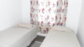 4 bedrooms, premium bedding, iron/ironing board, free WiFi