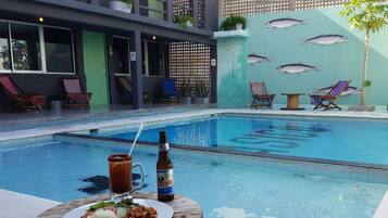 Outdoor pool, sun loungers