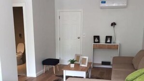 Apartamento clásico, vistas al mar | Sala de estar