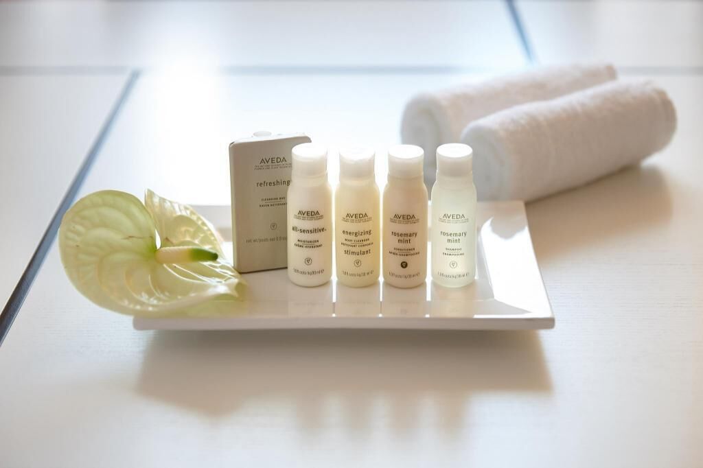 Bathroom amenities | Deep soaking tub, designer toiletries, hair dryer, bathrobes