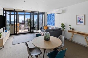 Lola: 2 Bedroom Comfort Apartment with City View | Living area | Flat-screen TV, pay films - Nook Melbourne Bank Tower Apartments (Southbank)