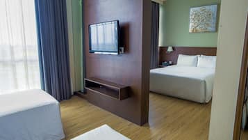 Standard Triple Room | Minibar, in-room safe, desk, soundproofing