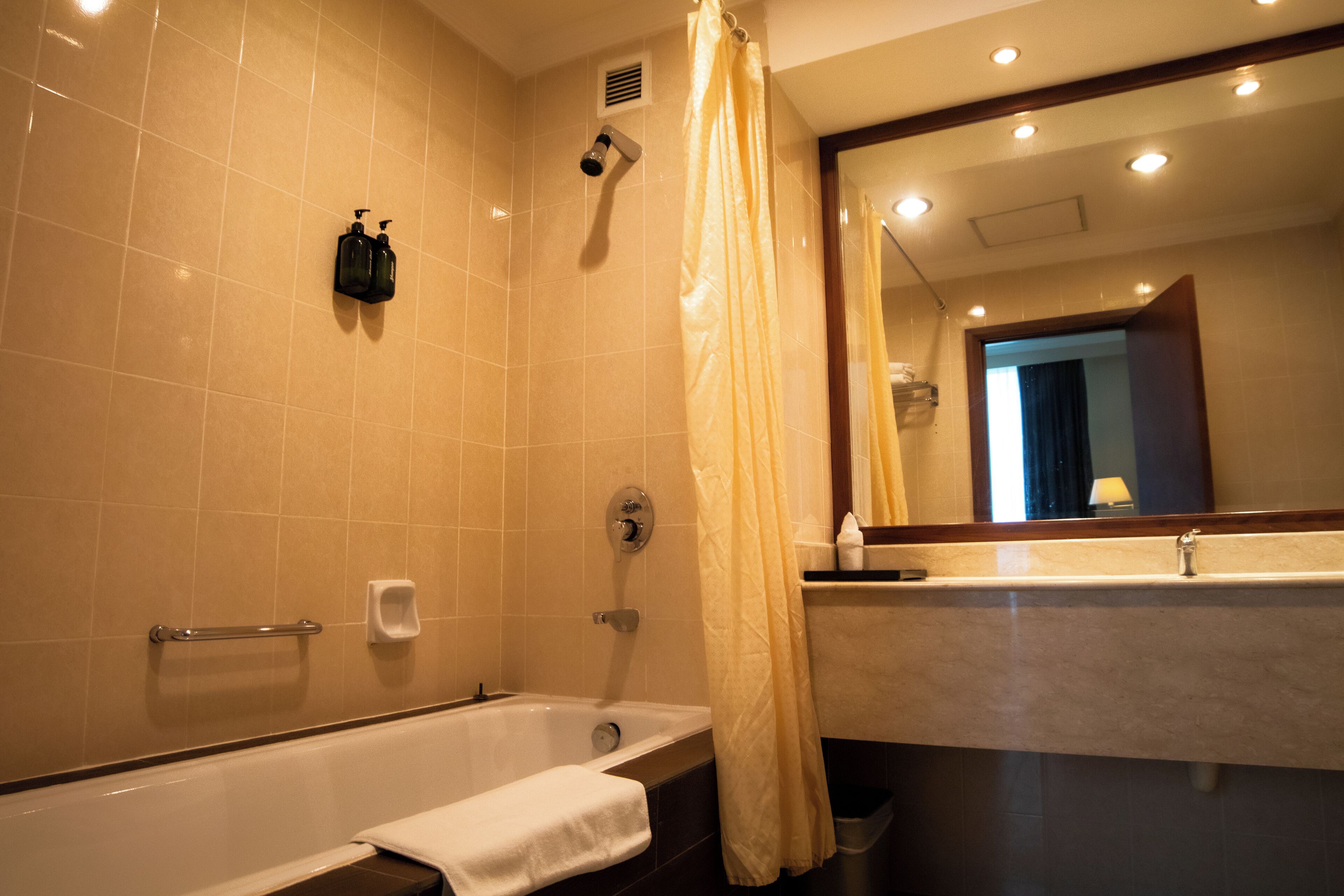 junior suite king | bathroom | free toiletries, hair dryer, slippers, towels