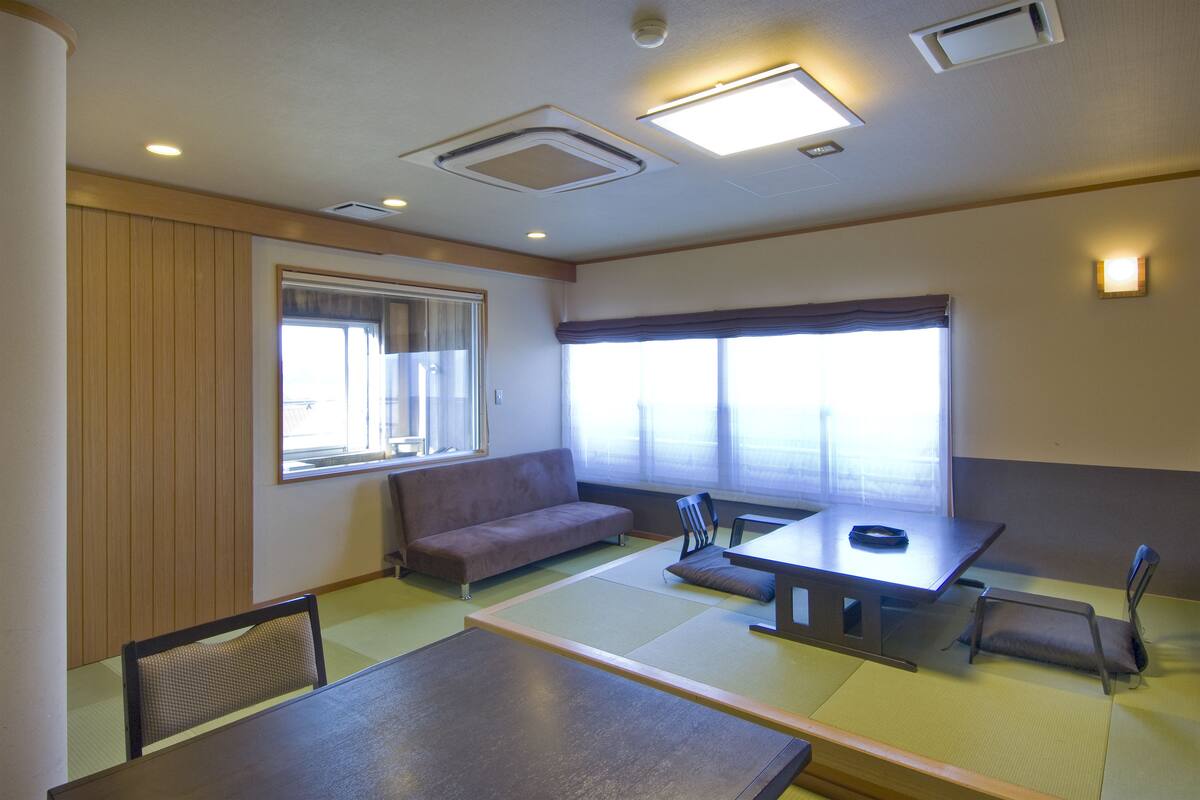 Executive Japanese Style Room with Private Open Air Bath, Wheelchair Accessible | Living area | Flat-screen TV
