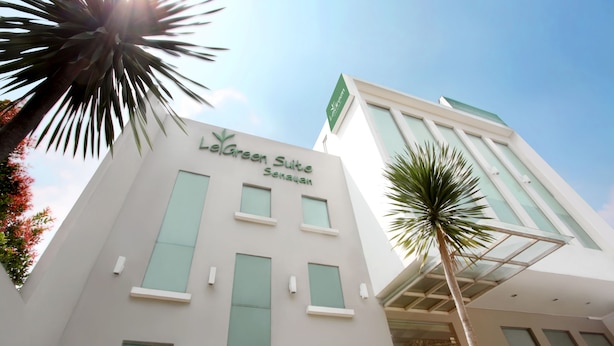 A building with a sign reading "LeGreen Suite Senay". - LeGreen Suite Senayan (Jakarta)