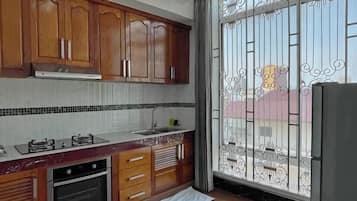 Fridge, electric kettle, highchair