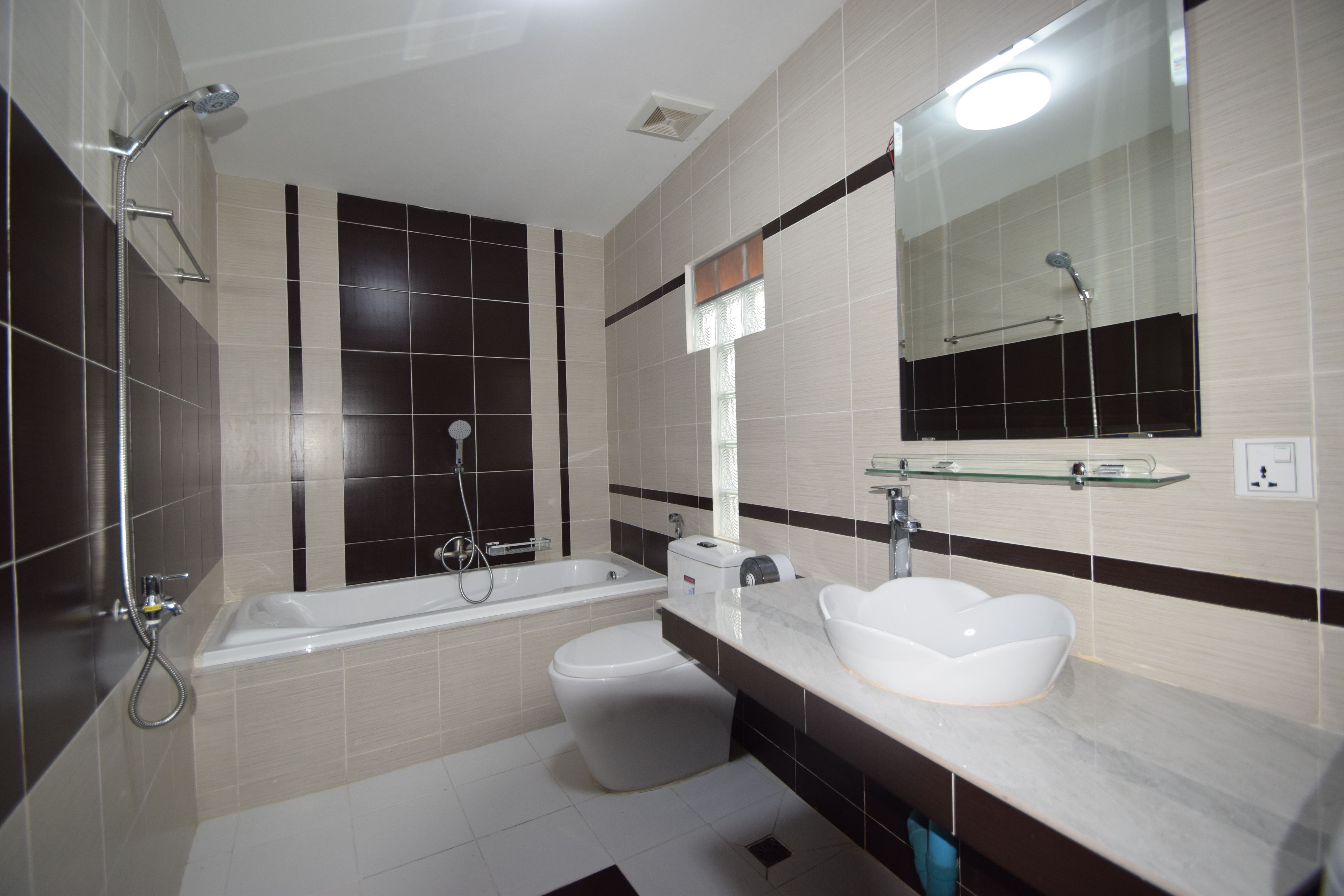 separate bathtub and shower, free toiletries, hair dryer, towels