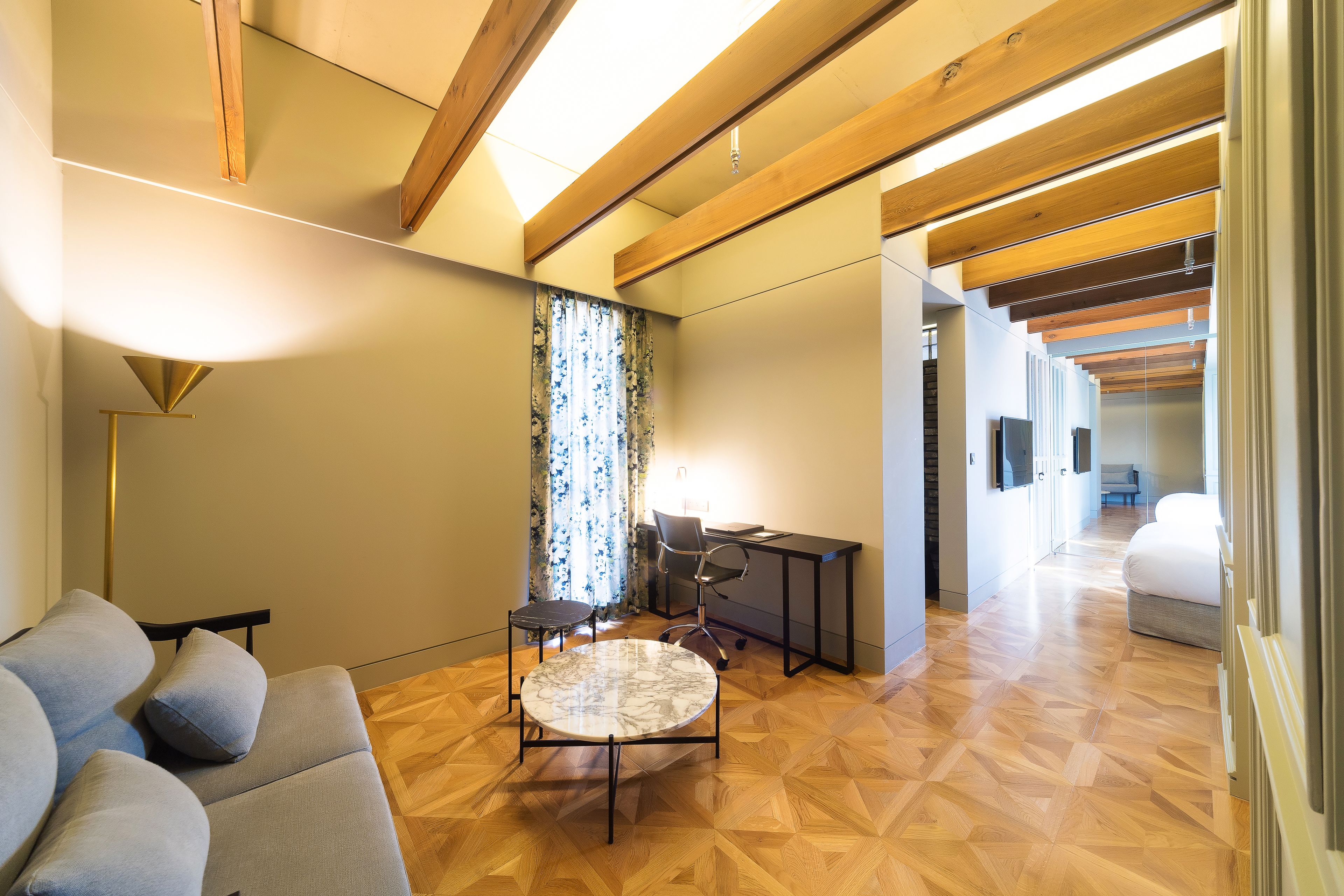 deluxe room | living area | 50-inch flat-screen tv with cable channels, tv