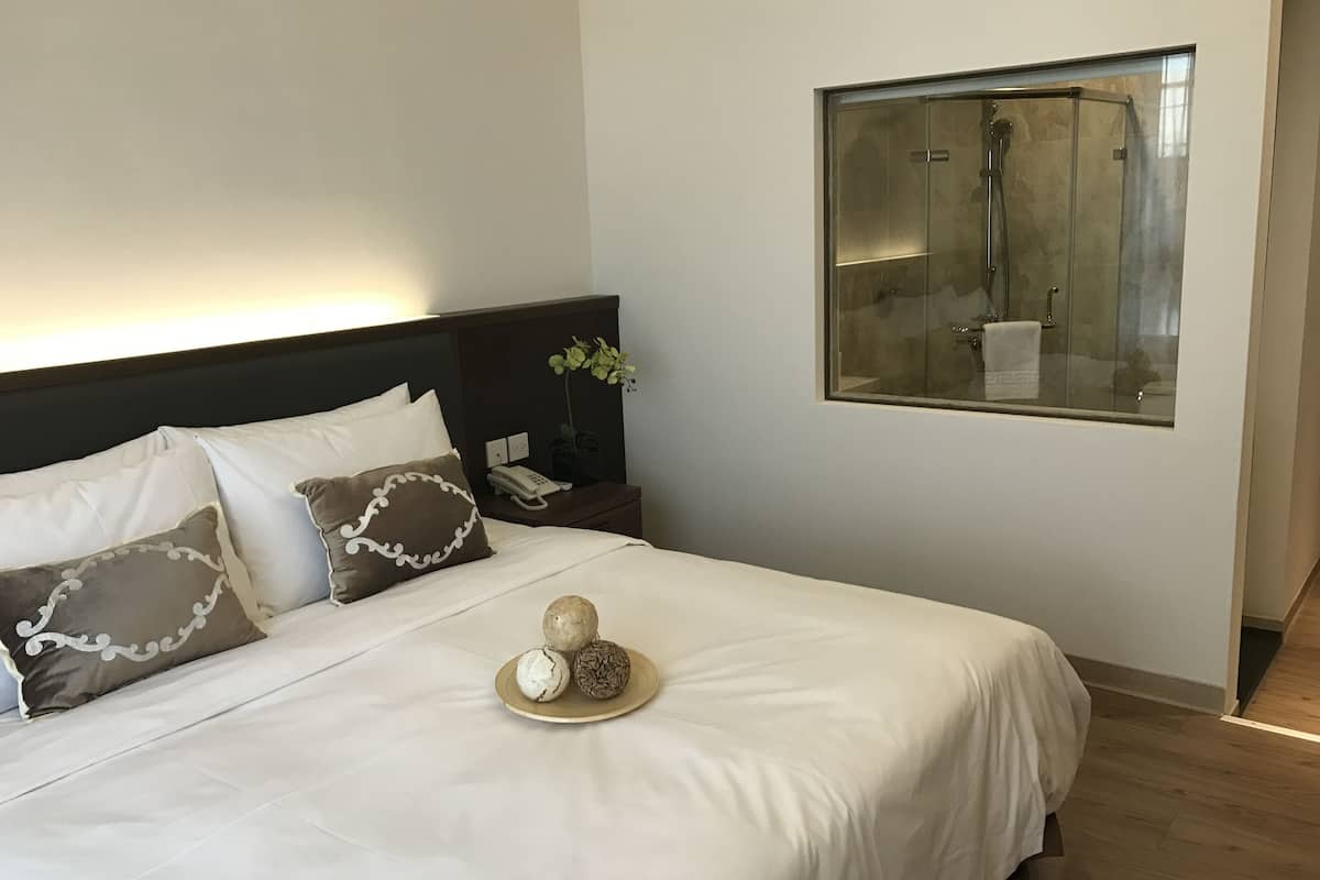 premium double room, 1 queen bed | premium bedding, down duvets, pillow-top beds, desk