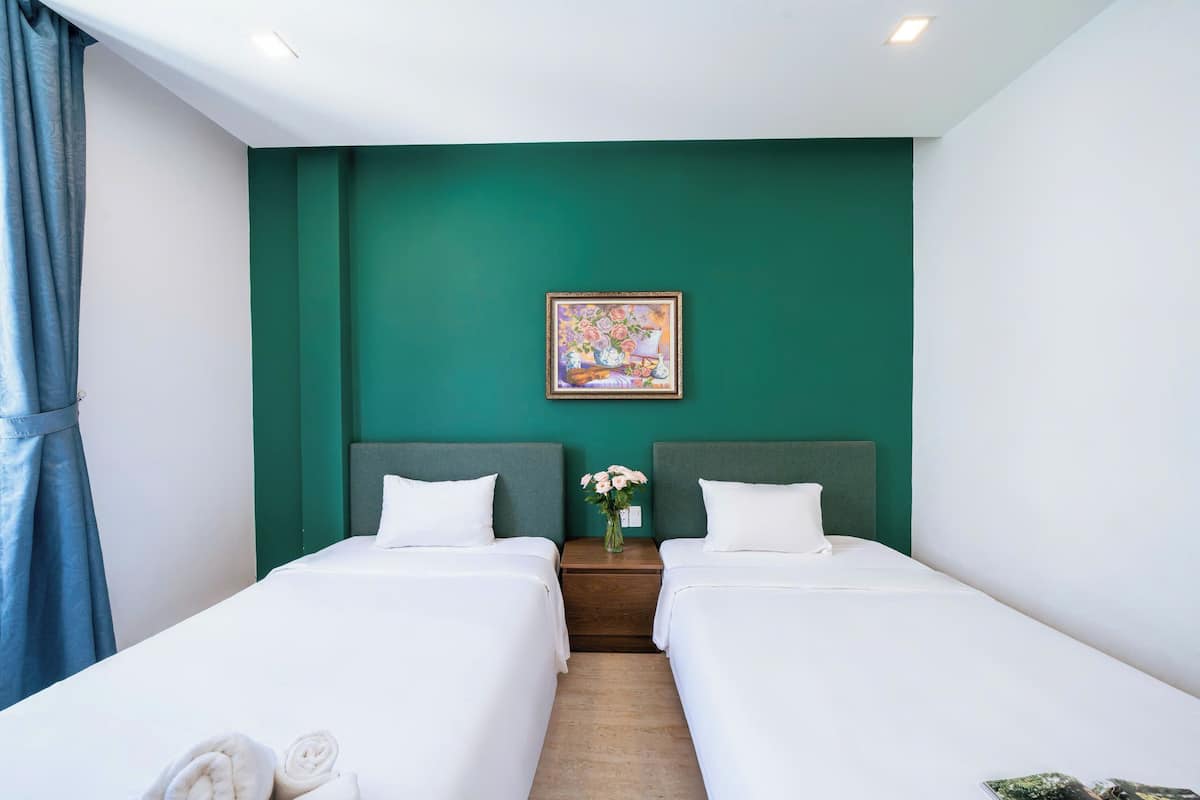 Habitación superior con 2 camas individuales | 1 habitación, caja de seguridad en la habitación y insonorización