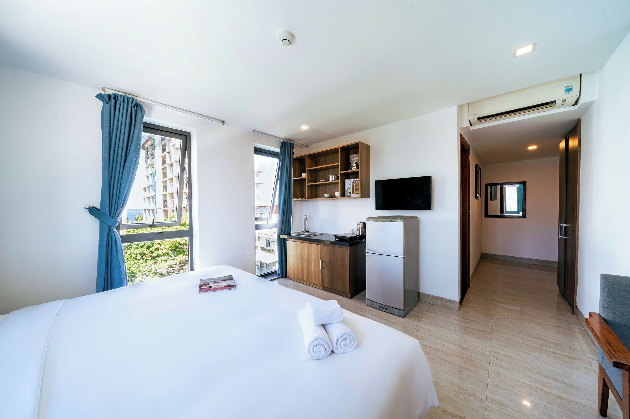 Phòng đôi Deluxe, cạnh bãi biển | Màn/rèm cản sáng, bàn ủi/dụng cụ ủi quần áo 