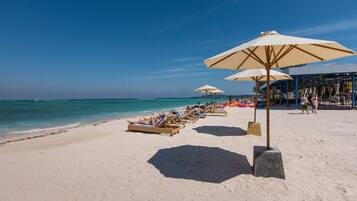 Private beach, white sand, beach umbrellas, beach massages