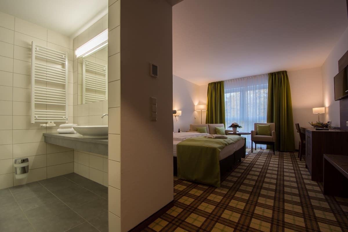 shower, eco-friendly toiletries, hair dryer, towels