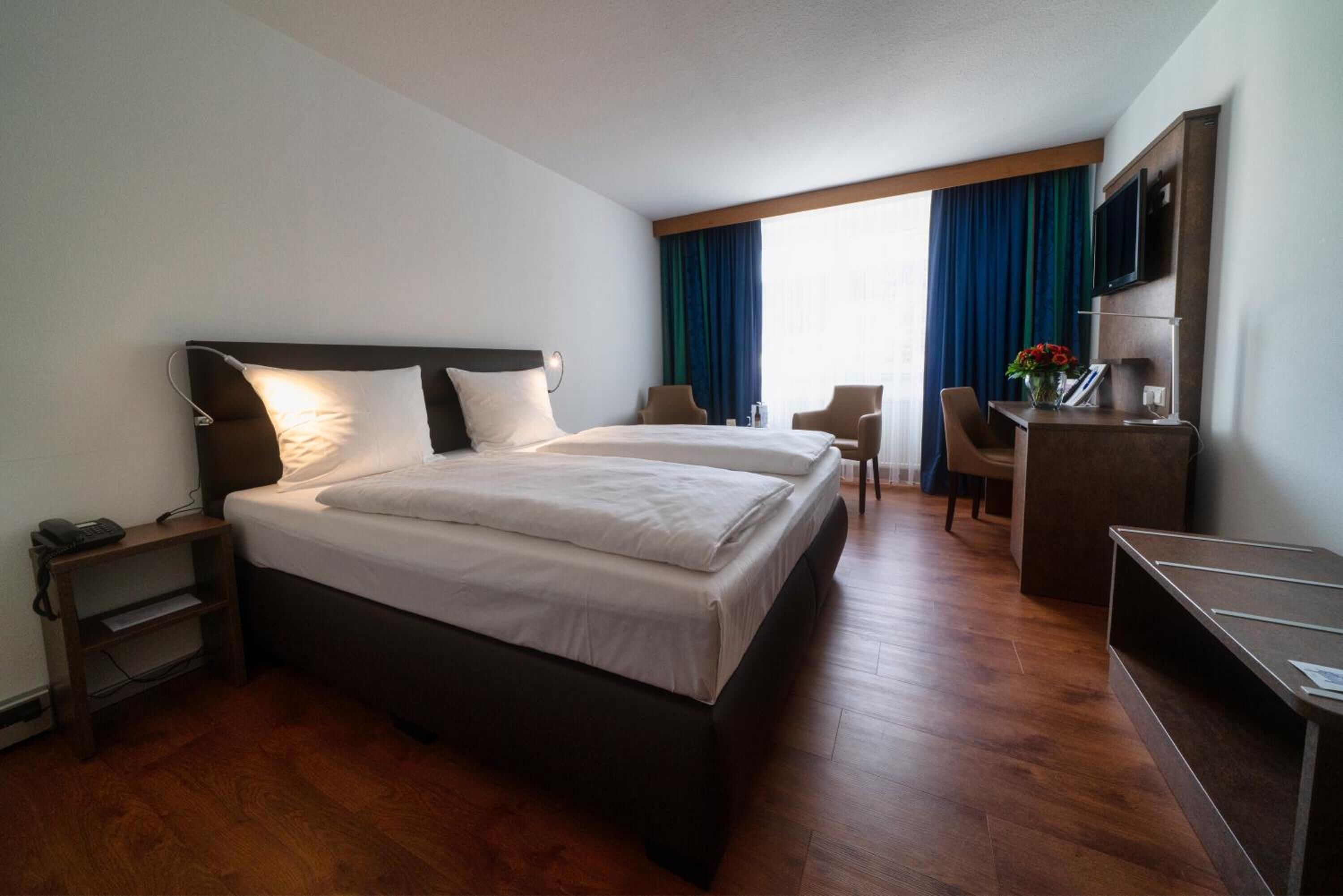 standard double room | hypo-allergenic bedding, desk, iron/ironing board, free cots/infant beds