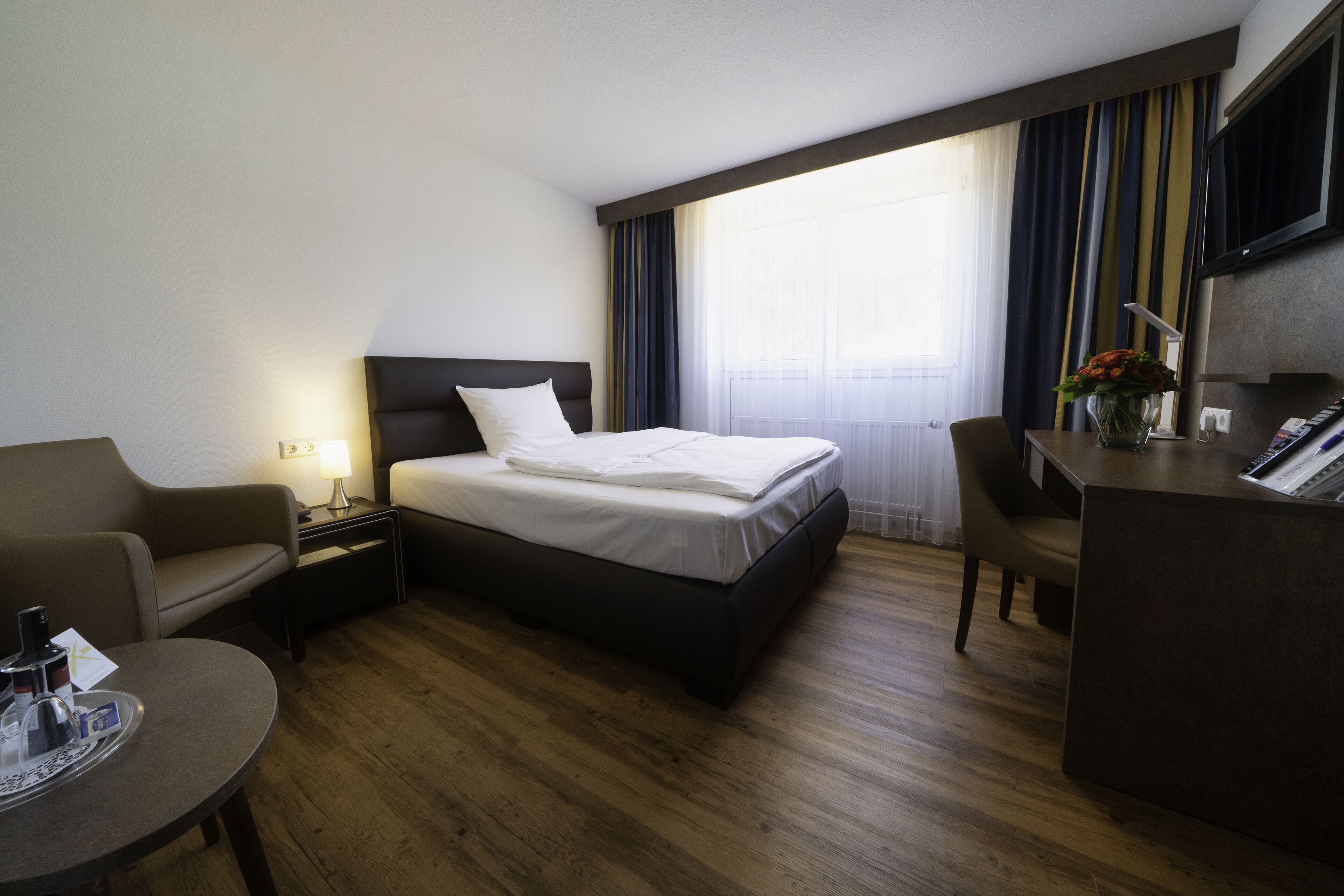 hypo-allergenic bedding, desk, iron/ironing board, free cots/infant beds