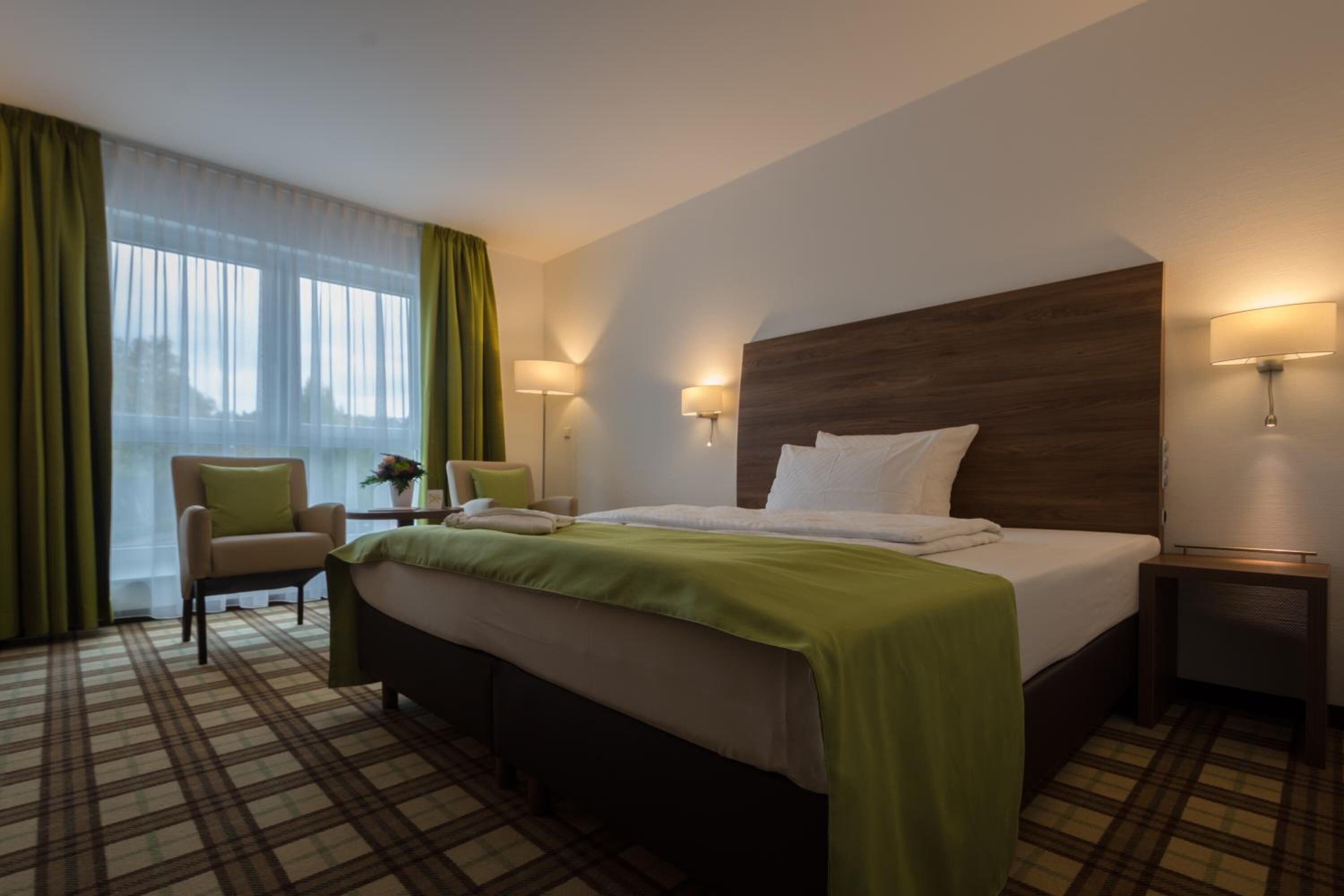 hypo-allergenic bedding, desk, iron/ironing board, free cots/infant beds