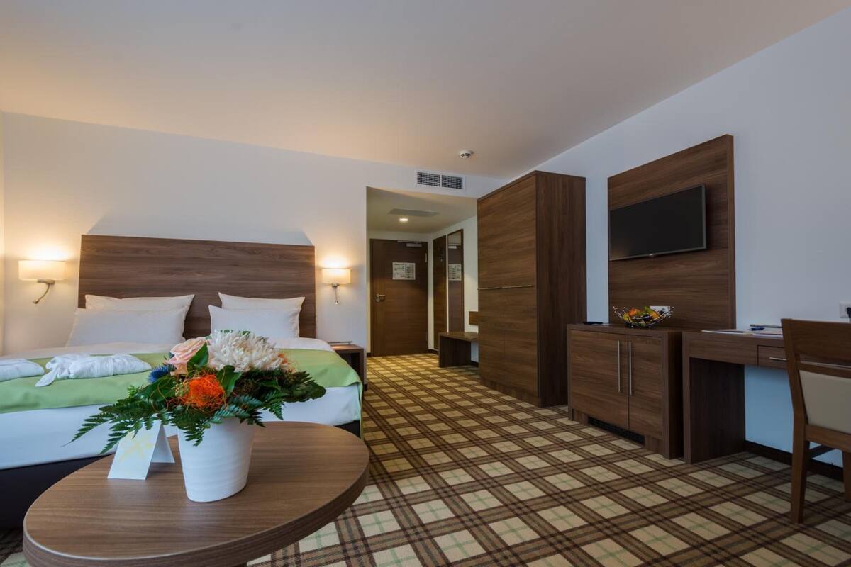 hypo-allergenic bedding, desk, iron/ironing board, free cots/infant beds