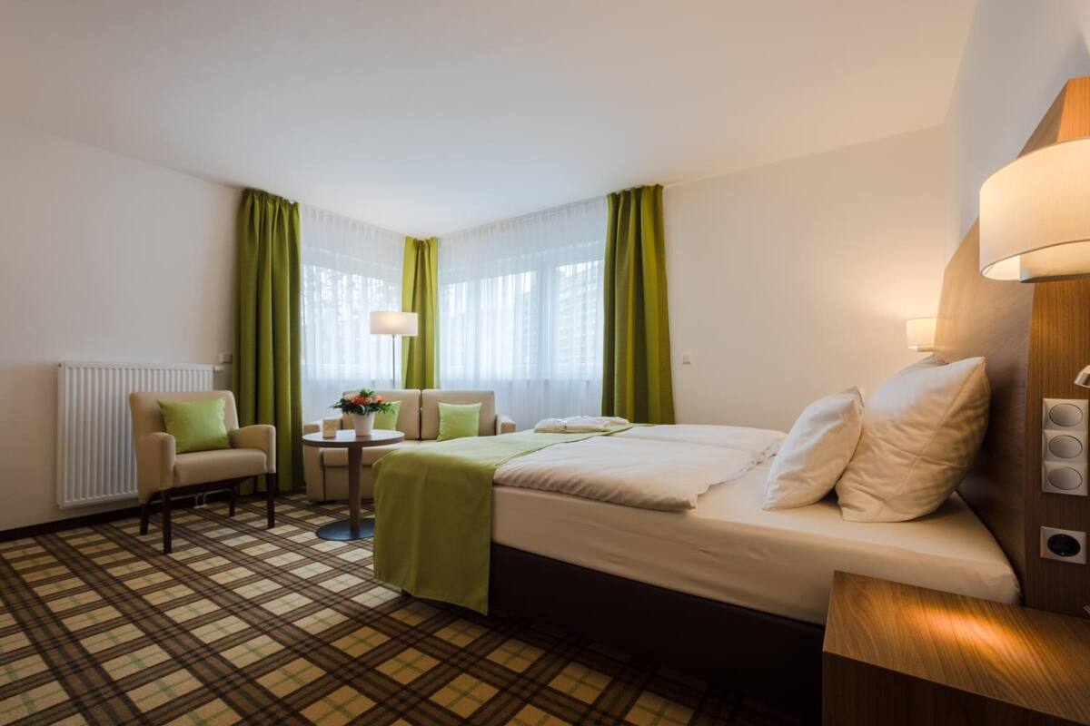 hypo-allergenic bedding, desk, iron/ironing board, free cots/infant beds