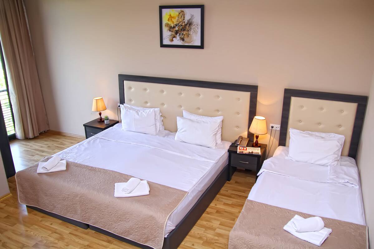 Standard Triple Room | Premium bedding, minibar, in-room safe, desk