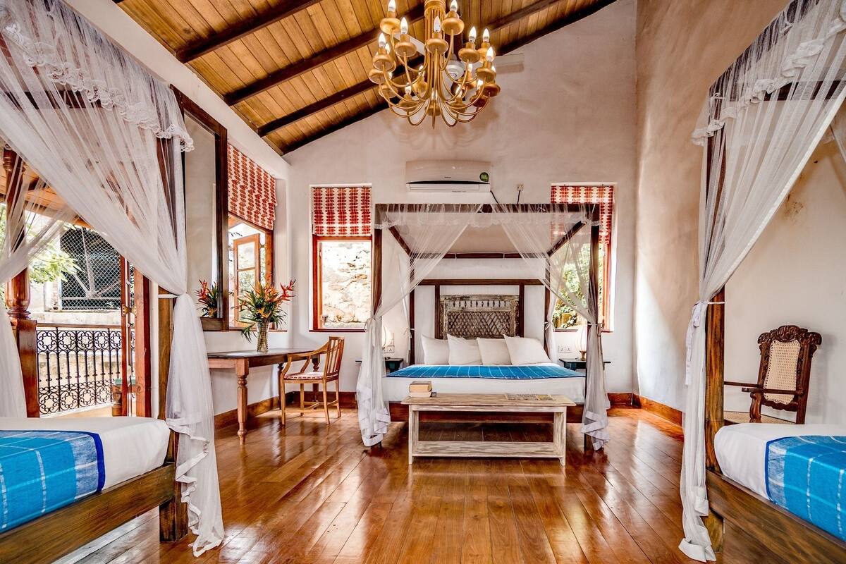 Deluxe Quadruple Room, 1 Bedroom, Garden View, Garden Area