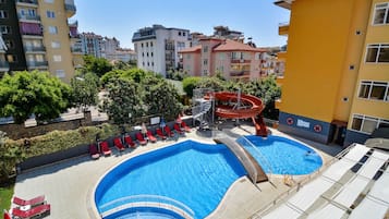 Outdoor pool, pool umbrellas, sun loungers