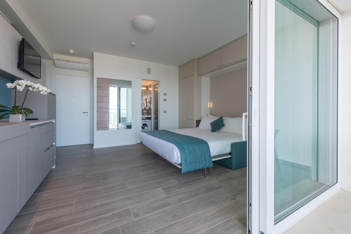 Premium bedding, down duvets, in-room safe, desk
