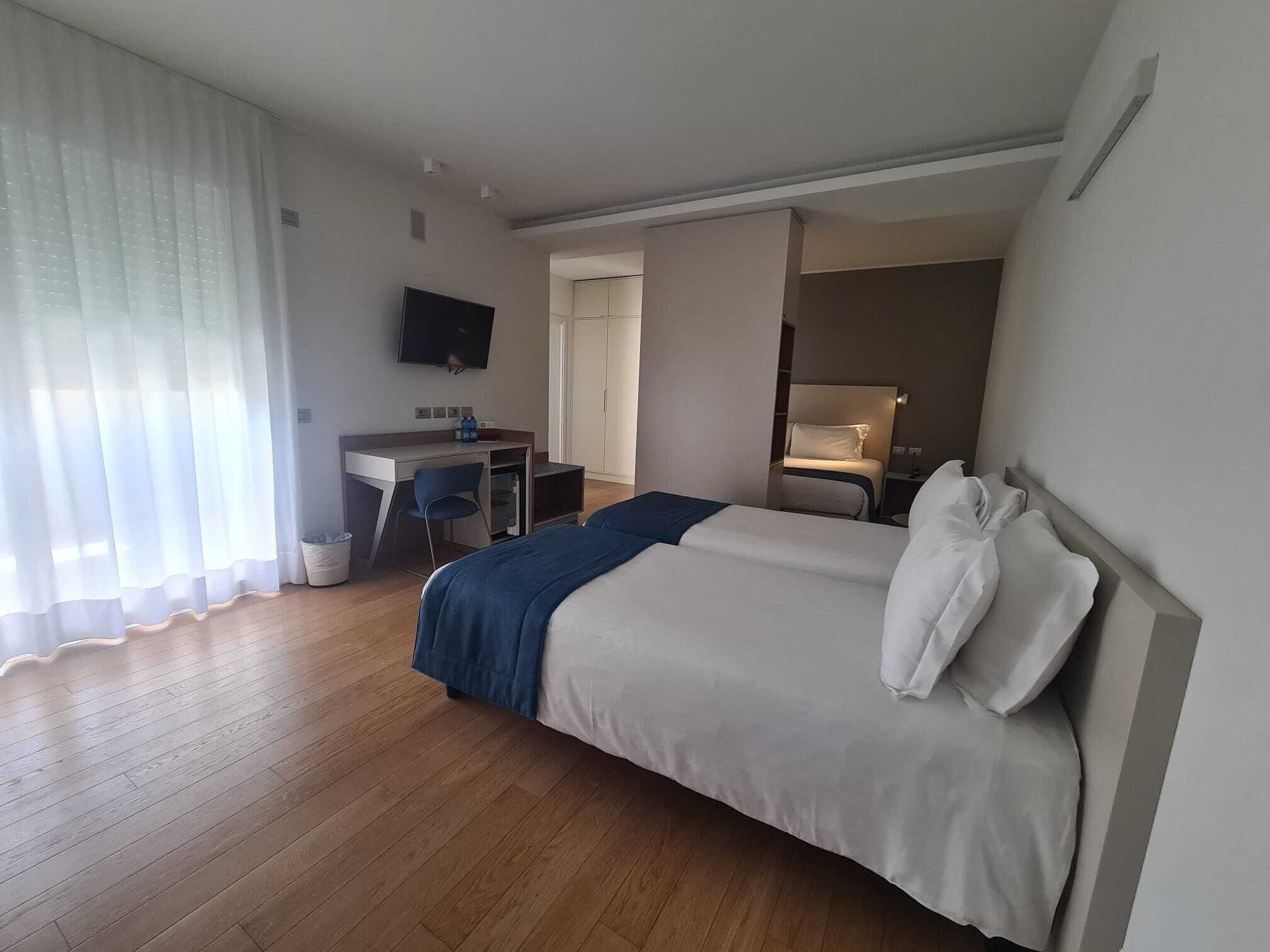 Camera quadrupla, 1 camera da letto, vista cortile | Biancheria da letto di alta qualità, copriletto in piuma