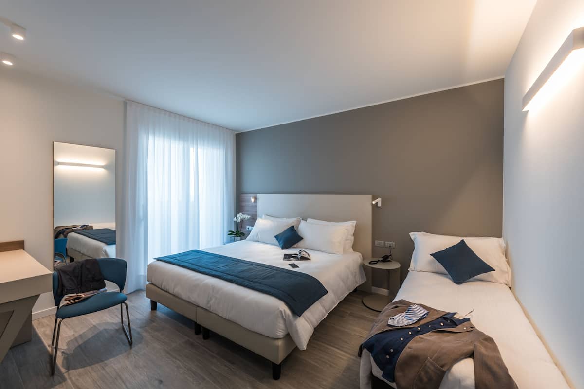 Premium bedding, down duvets, in-room safe, desk
