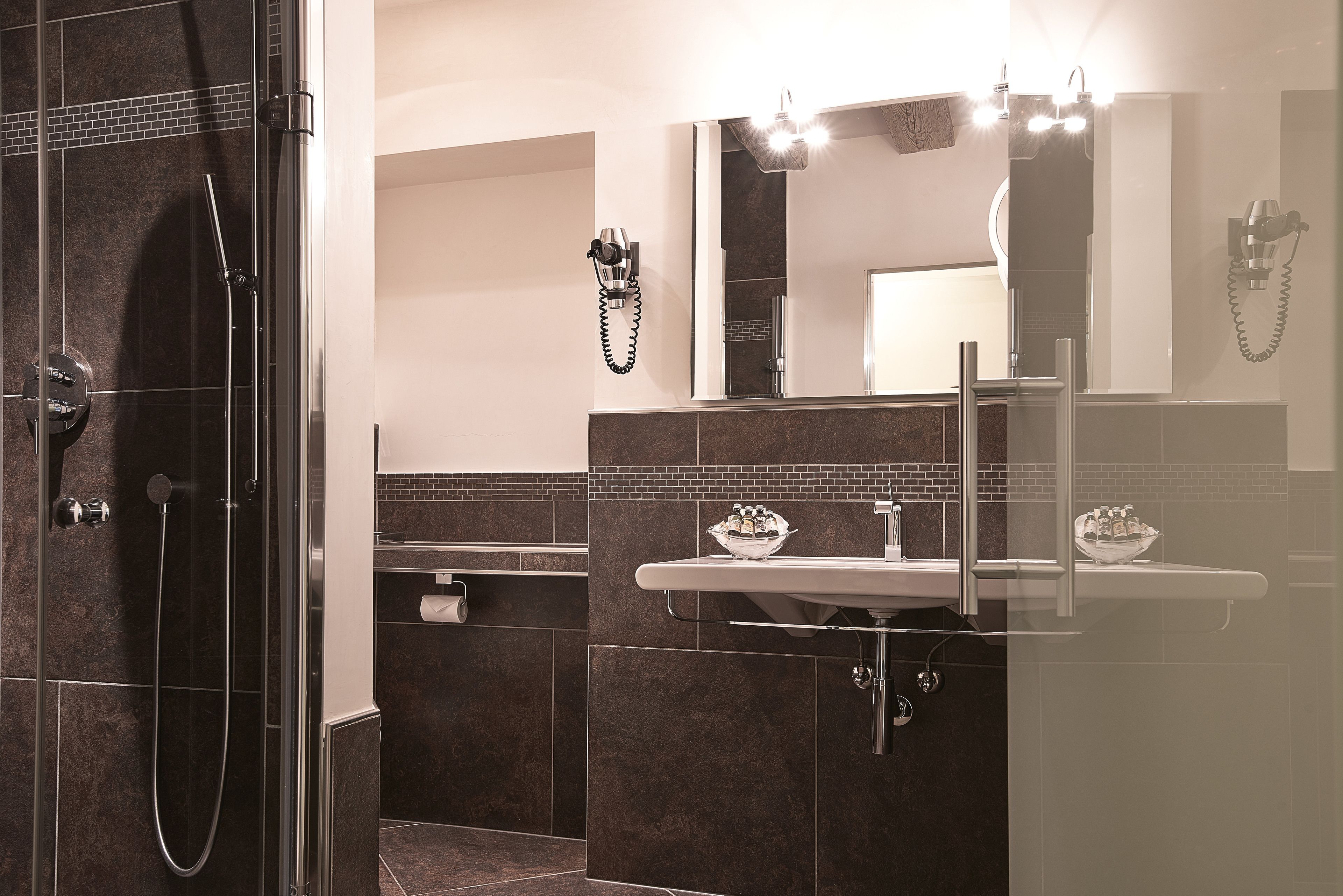 free toiletries, hair dryer, dressing gowns, slippers