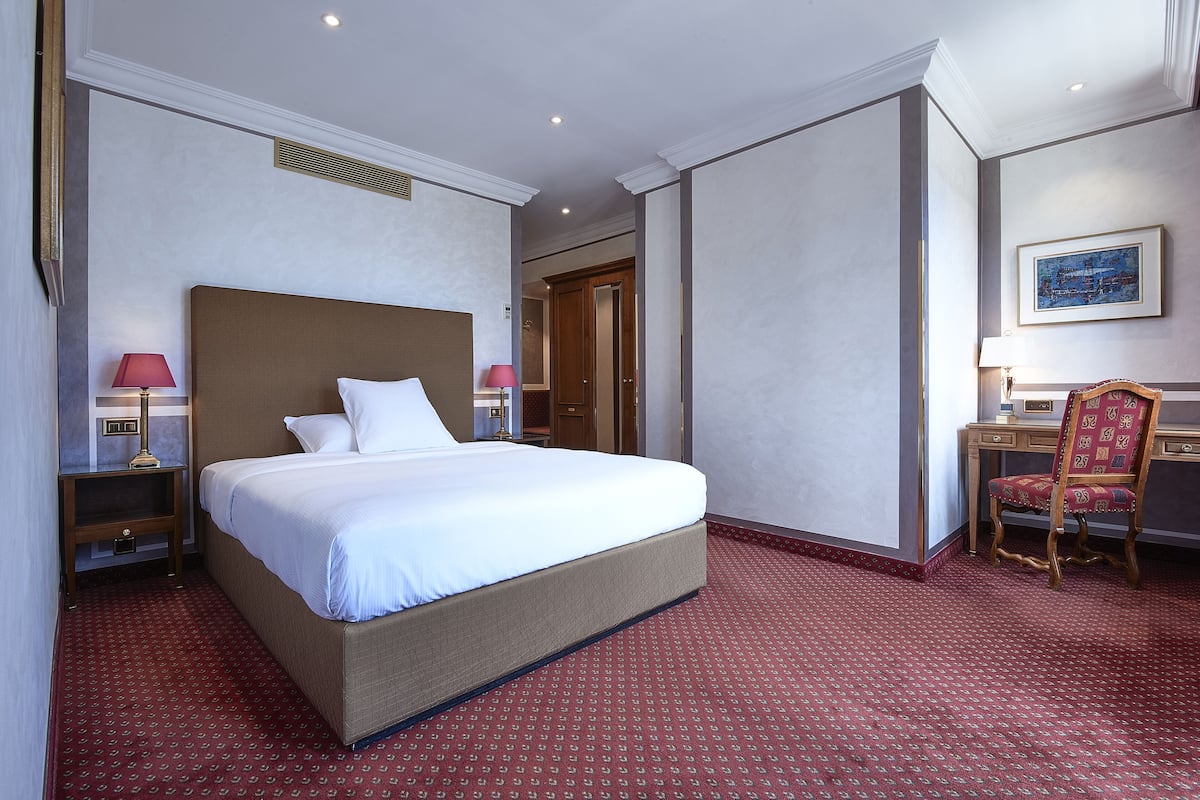 Standard Single Room | 1 bedroom, minibar, in-room safe, desk