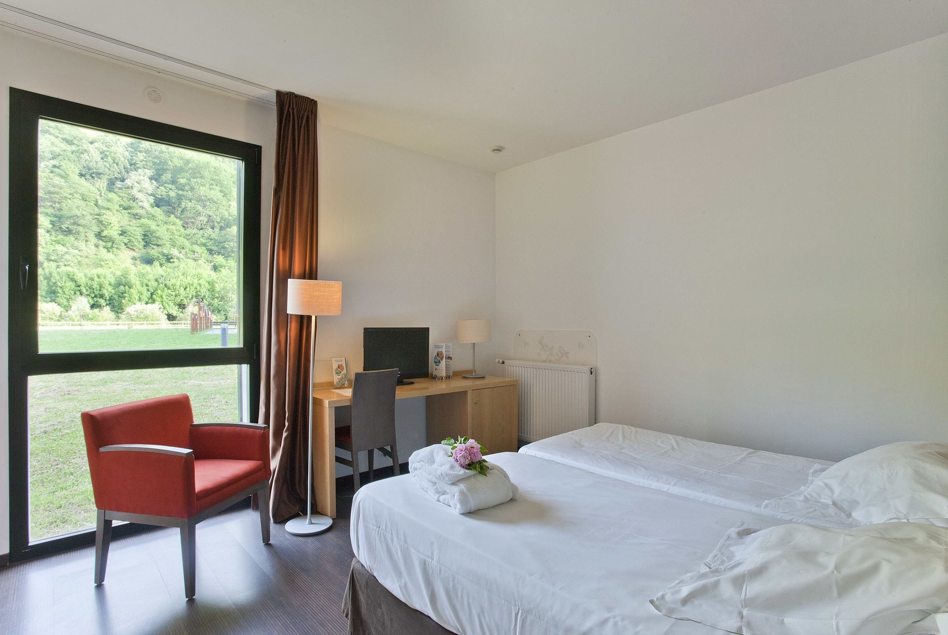 twin room | minibar, in-room safe, desk, laptop workspace