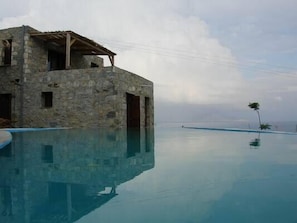 Seasonal outdoor pool, pool loungers