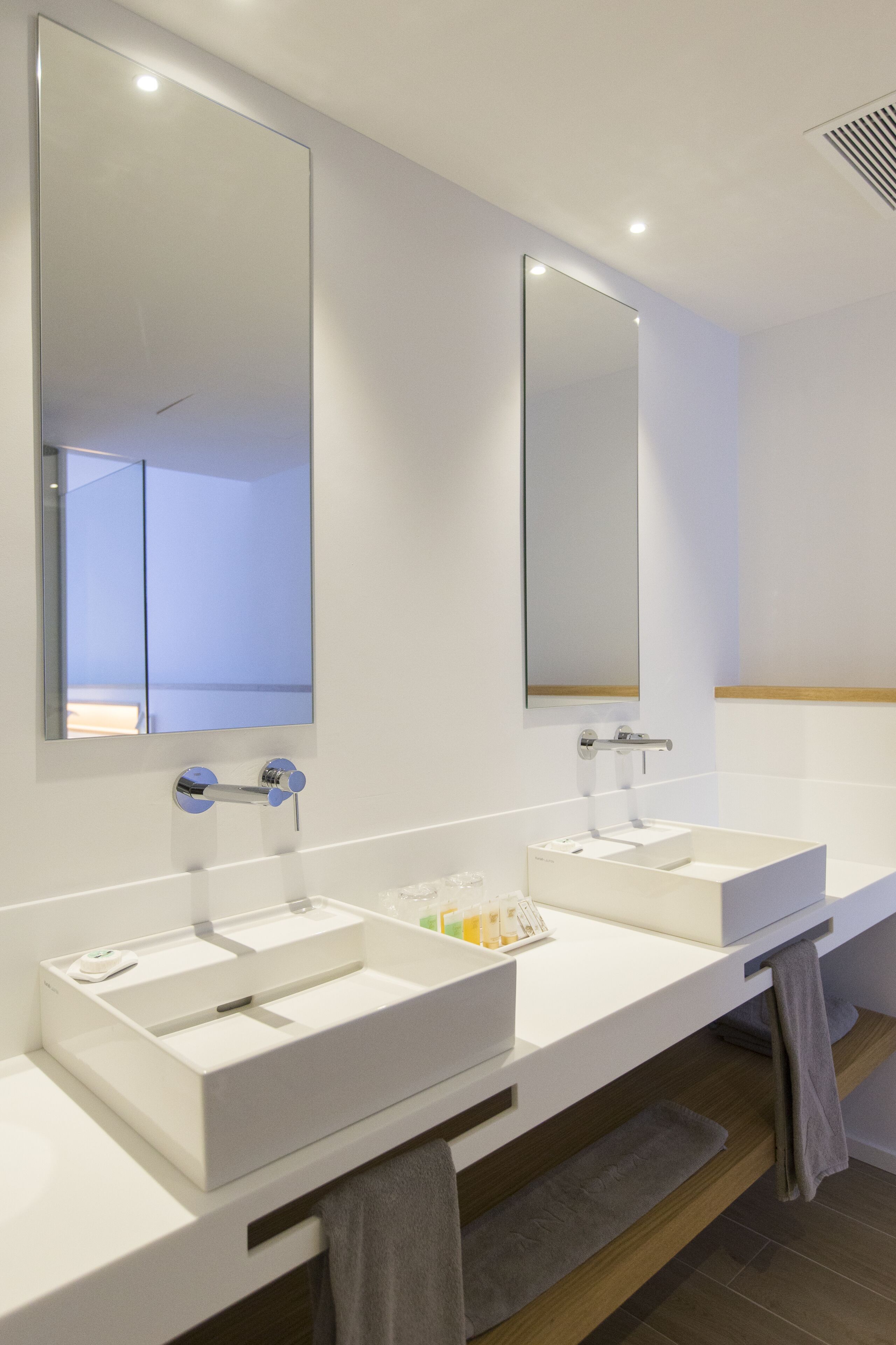 superior double room | bathroom | rainfall showerhead, free toiletries, hair dryer, towels